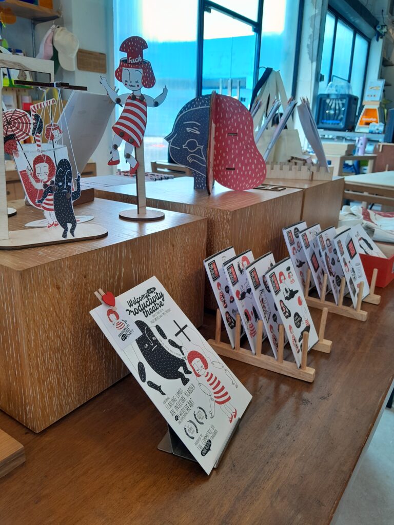 Postcards that double as mobiles at Sanguinella: Ink and Fire art exhibition