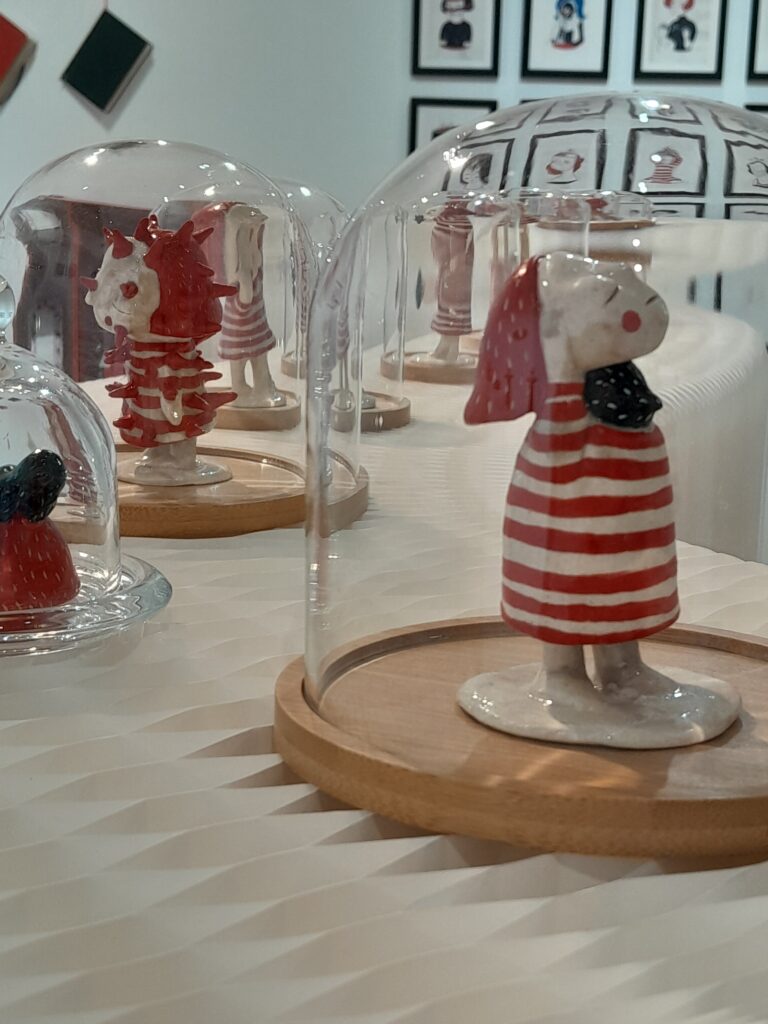 Ceramic figurines at Sanguinella: Ink and Fire art exhibition